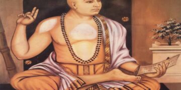 "Traditional portrait of Sri Madhvacharya sitting in a meditative posture, holding a palm-leaf manuscript (shastra) and showing the Chin-mudra, symbolizing divine knowledge and Dvaita philosophy.