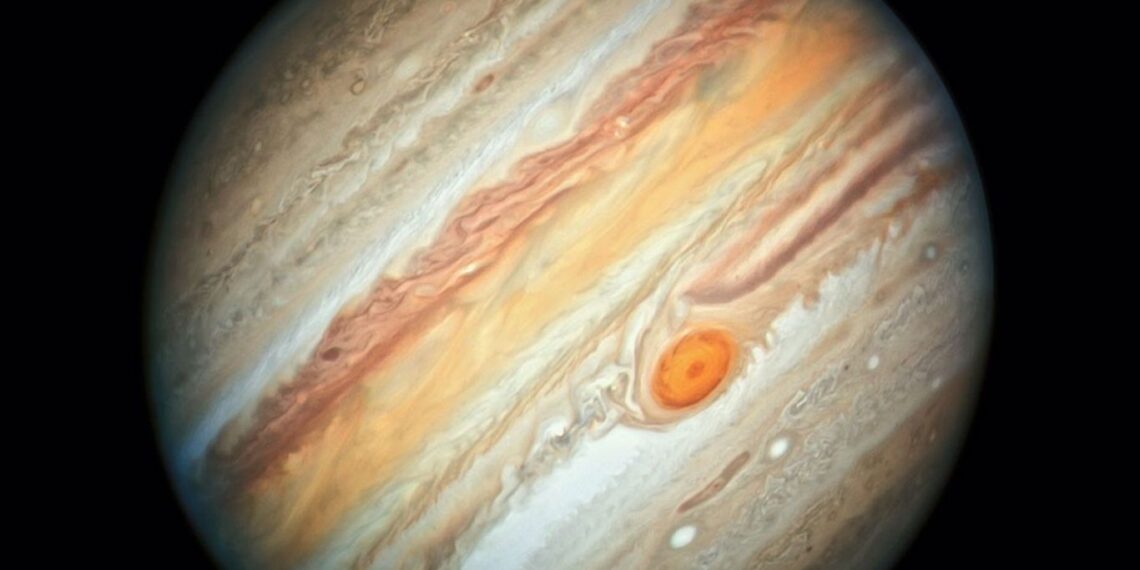 Jupiter planet with its iconic Great Red Spot and colorful atmospheric bands in deep space.