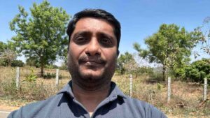 Website Developer Kishor Narayan On Blue sky and tree background