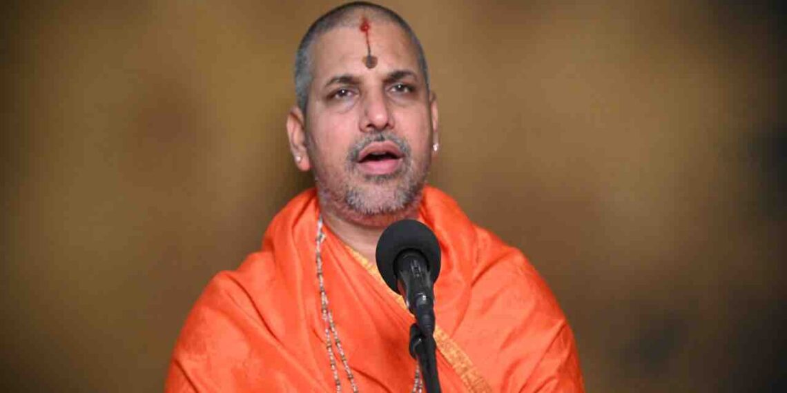 Dr Bhimsenacharya Atanur delivering a spiritual discourse on Adhika Masa significance.
