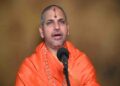 Dr Bhimsenacharya Atanur delivering a spiritual discourse on Adhika Masa significance.