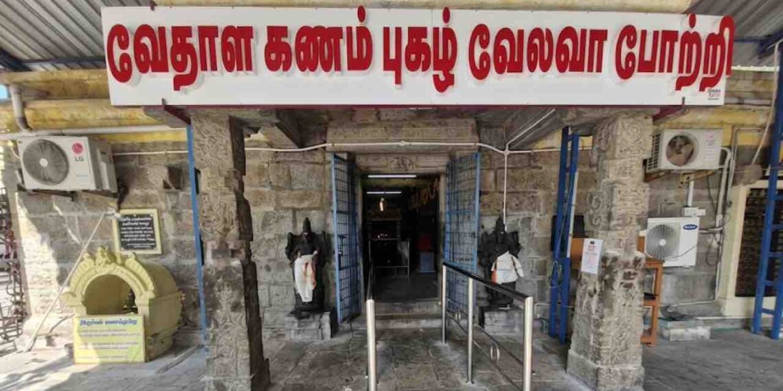Main entrance of Sri Kandaswamy Temple in Cheyyur, Chengalpattu, featuring stone pillars and Tamil signage.