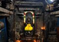 Sanctum of Sri Suddha Ratneswarar Temple at Oottathur, Tamil Nadu, featuring the sacred deity amidst ancient stone architecture and oil lamps.
