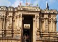 Main entrance and stone carved architecture of Thirukolur Vaithamanidhi Perumal Temple in Tamil Nadu.